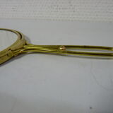 Old mirror double face with golden hand