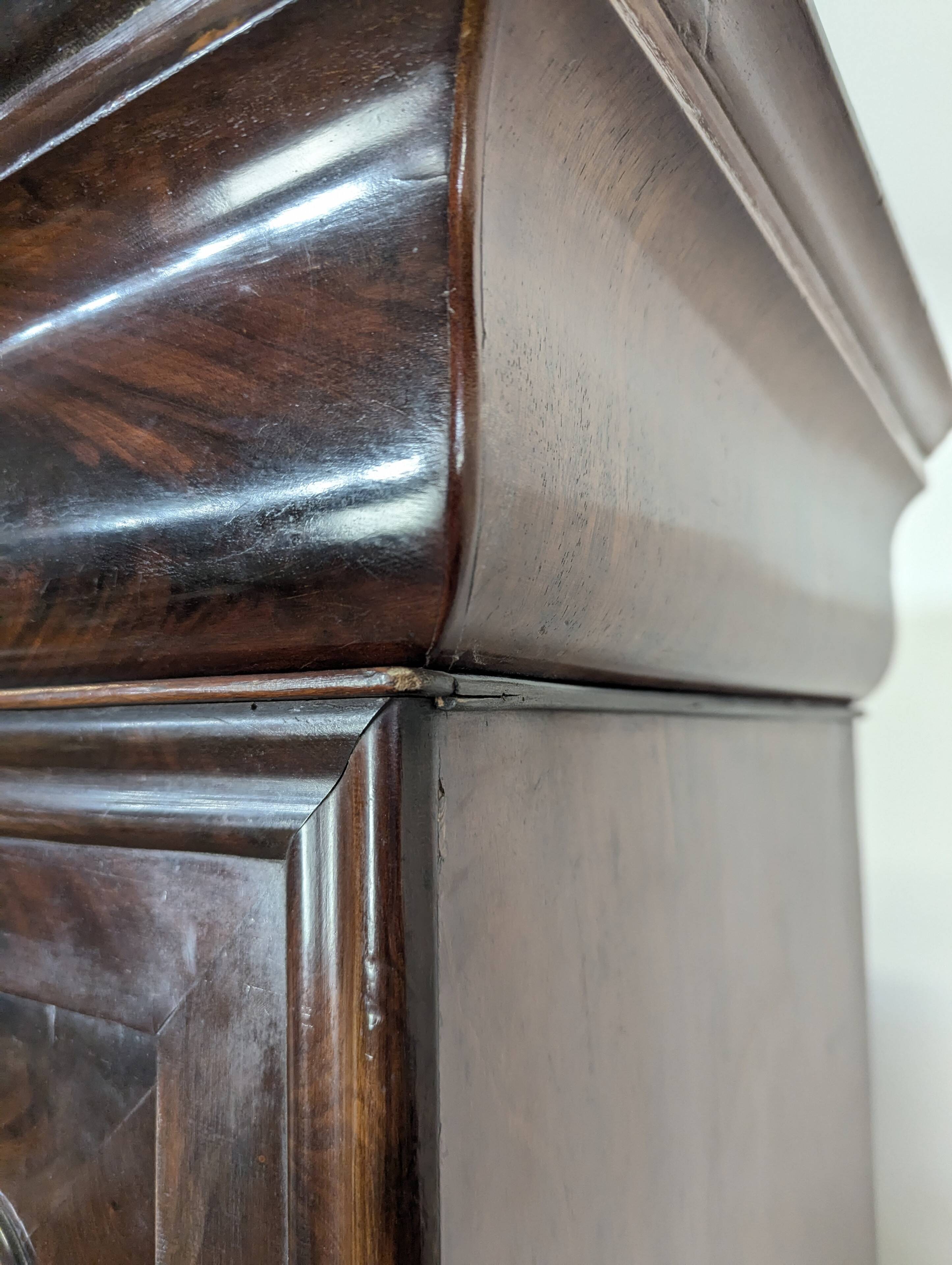 Louis Philippe period glass cabinet in flamed mahogany