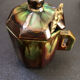 Large service in green and brown glazed stoneware with facets, signed Louis Cag.