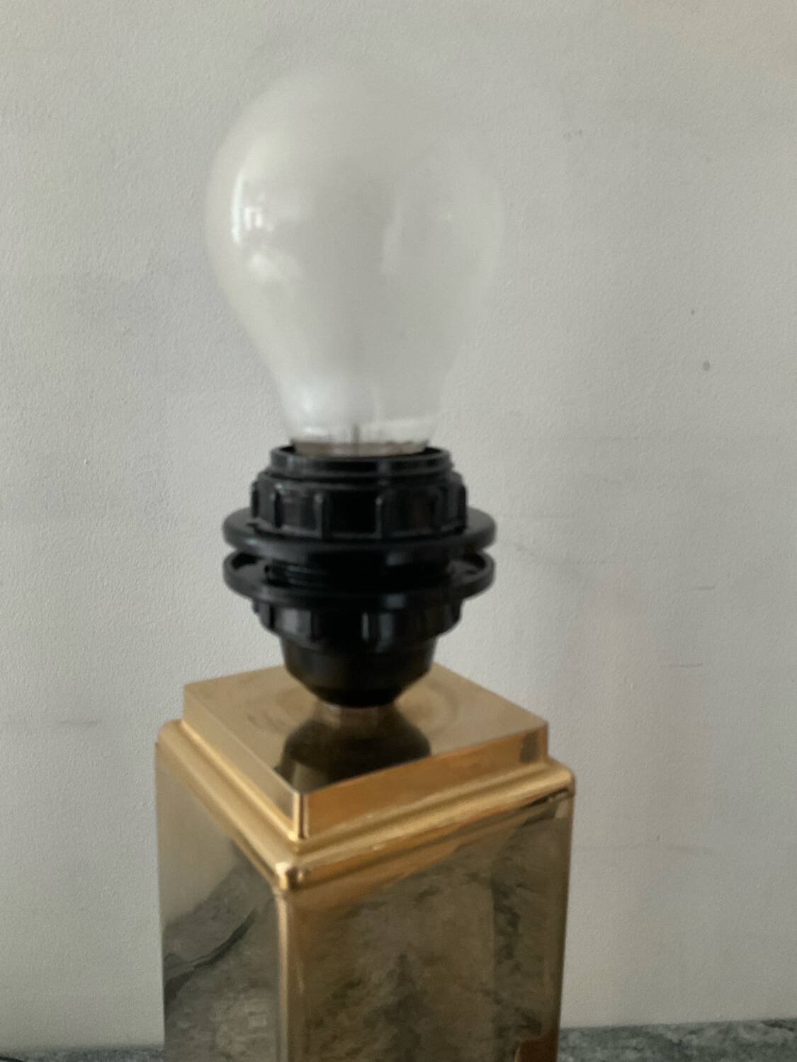 Pair of Hollywood Regency brass table lamps from the 1970s.