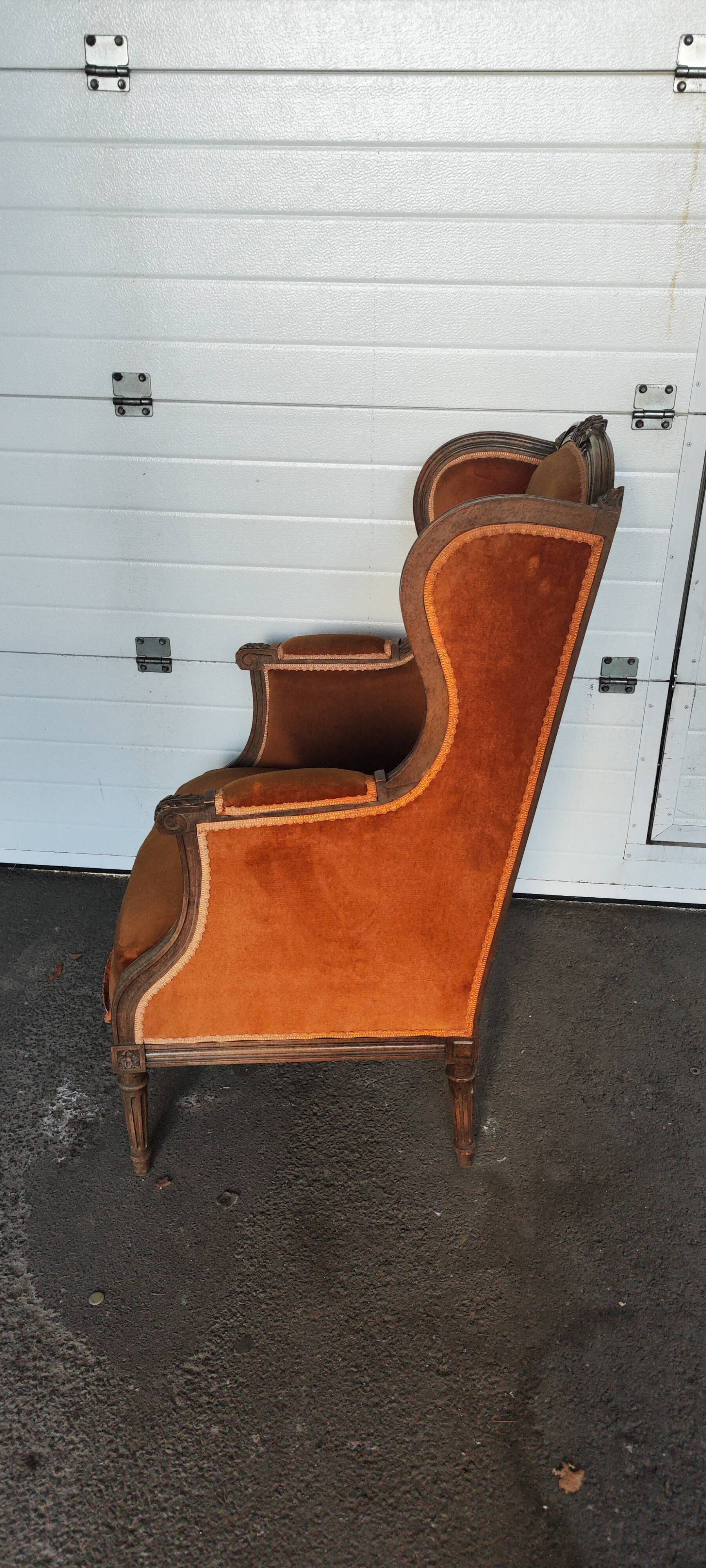 Large Louis XVI style bergère armchair in amber brown velvet