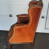 Large Louis XVI style bergère armchair in amber brown velvet
