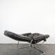 Stressless armchair and ottoman in leather from the 1970s.