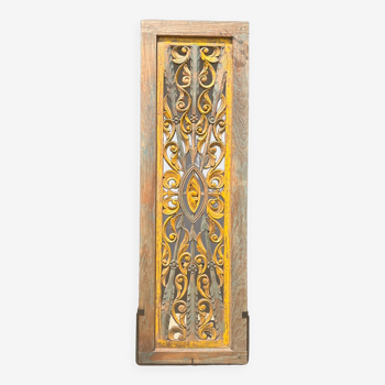 Rectangular Indonesian construction element with blue and yellow plant in carved wood