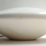 White resin planter in saucer shape - futuristic movement