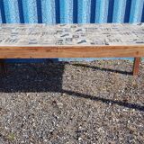 Teak dining table with illustrated top