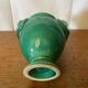 Antique green ceramic vase with handles
