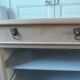 crafted dresser in raw solid wood.