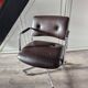 Vintage strafor brown leather armchair with casters