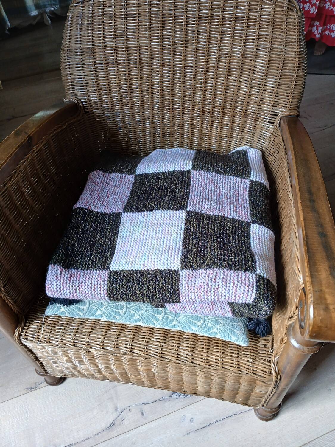 Hand-knitted patchwork plaid