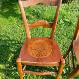 bistro chairs with pattern on the seat