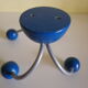 Grey metal wall hook, 4 wooden hangers