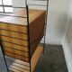 Scandinavian modular shelf with string scale