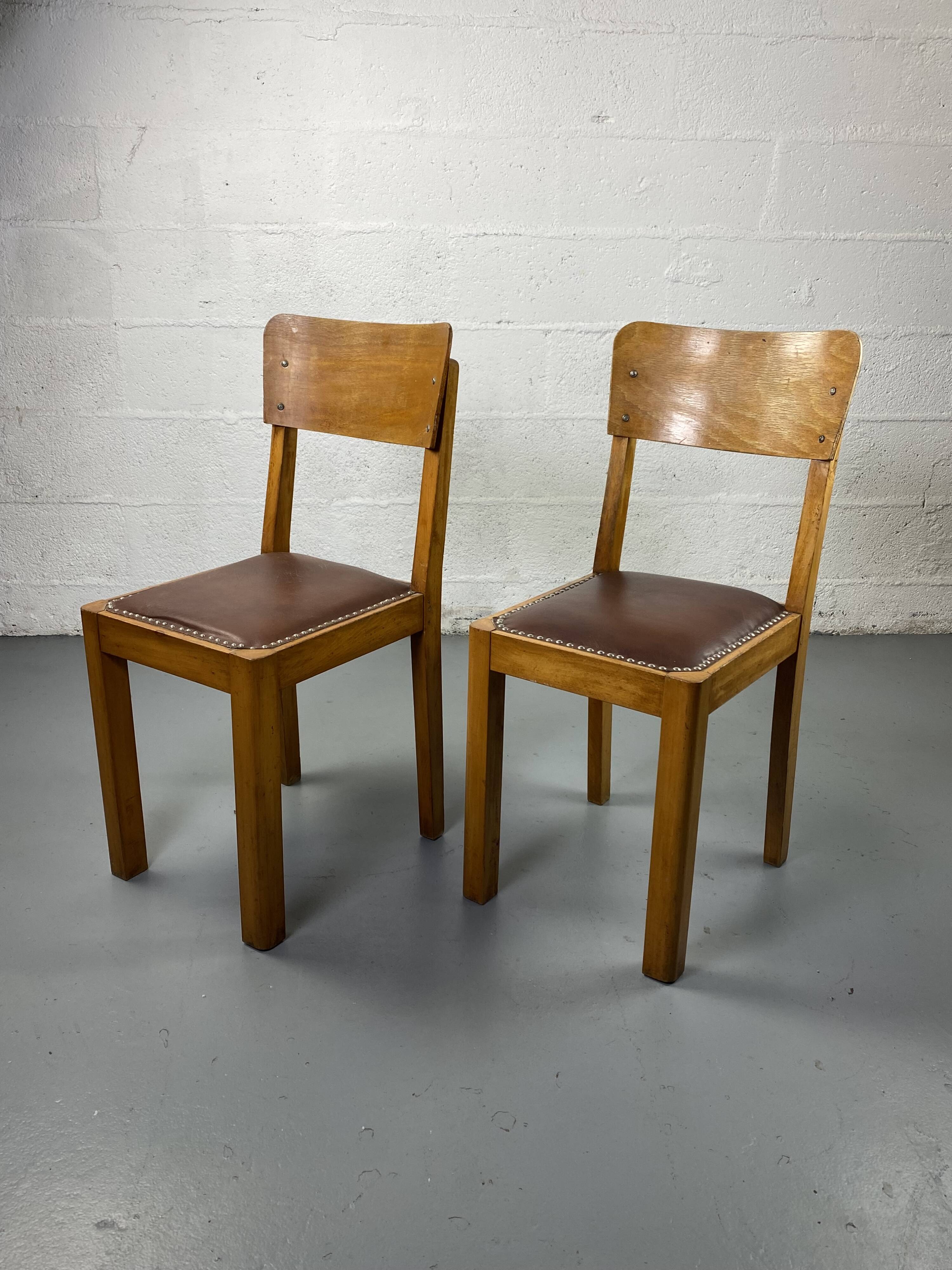 Wooden and leather chairs
