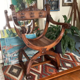 Gothic Curule Dagobert armchair in carved walnut, 19th century
