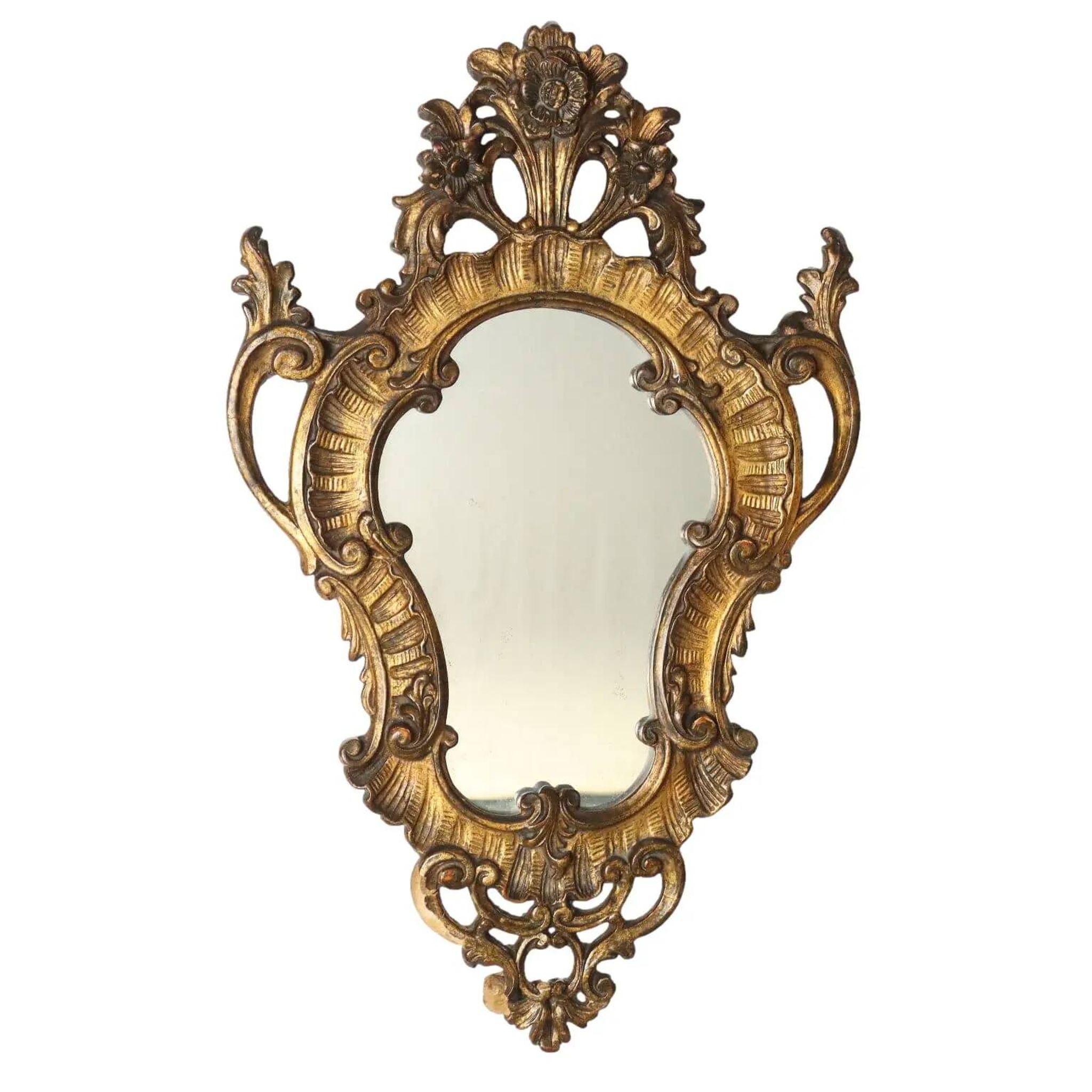 Antique Rococo-style mirror, gilded linden decorations, 20th century.
