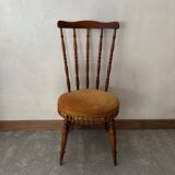 Wooden chair with yellow velvet