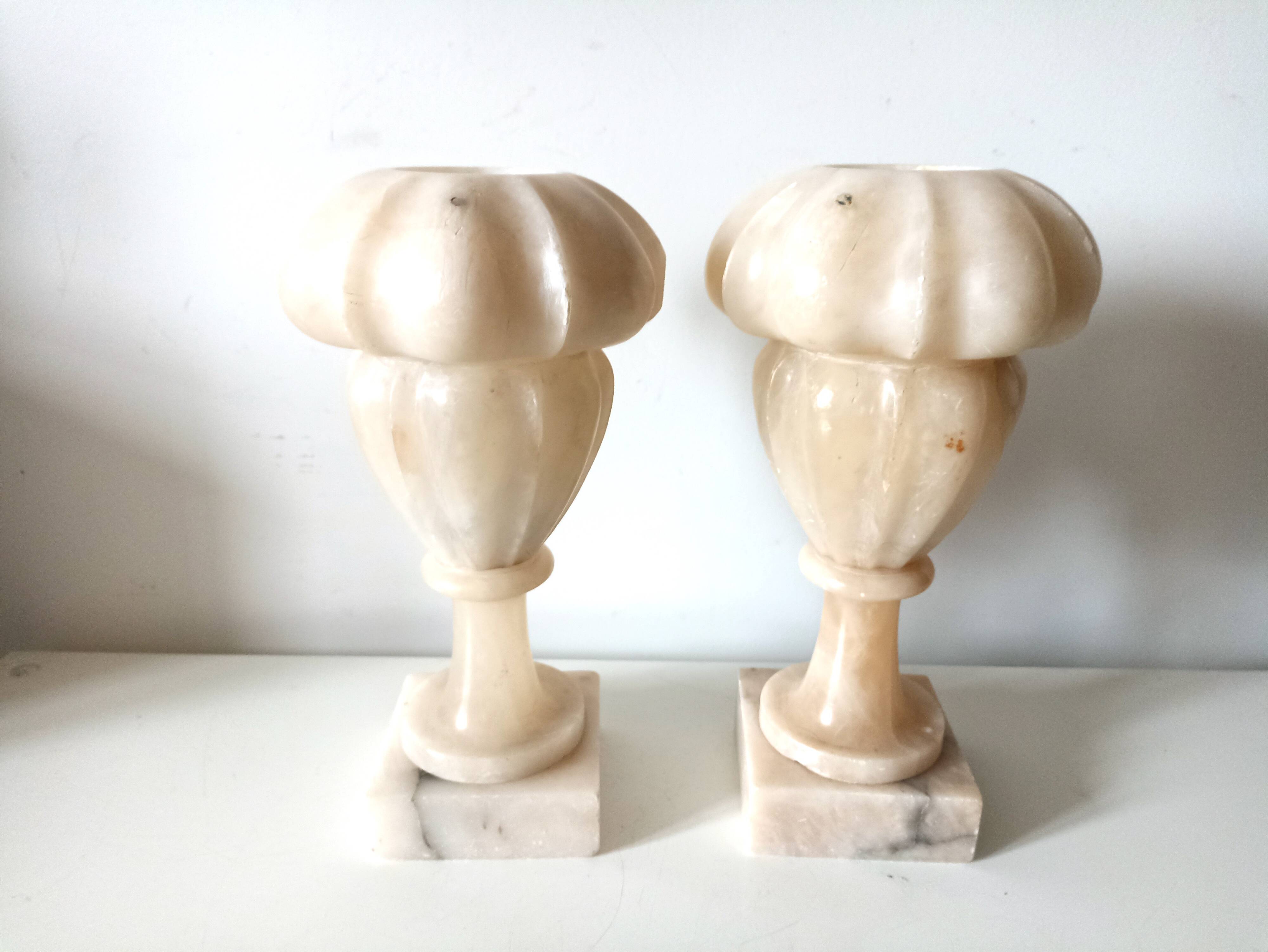 Pair of alabaster fireplace vases on marble base