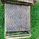 Armchair in rattan with rest foot 60s