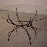 Folding wrought iron table base and indoor/outdoor glass top
