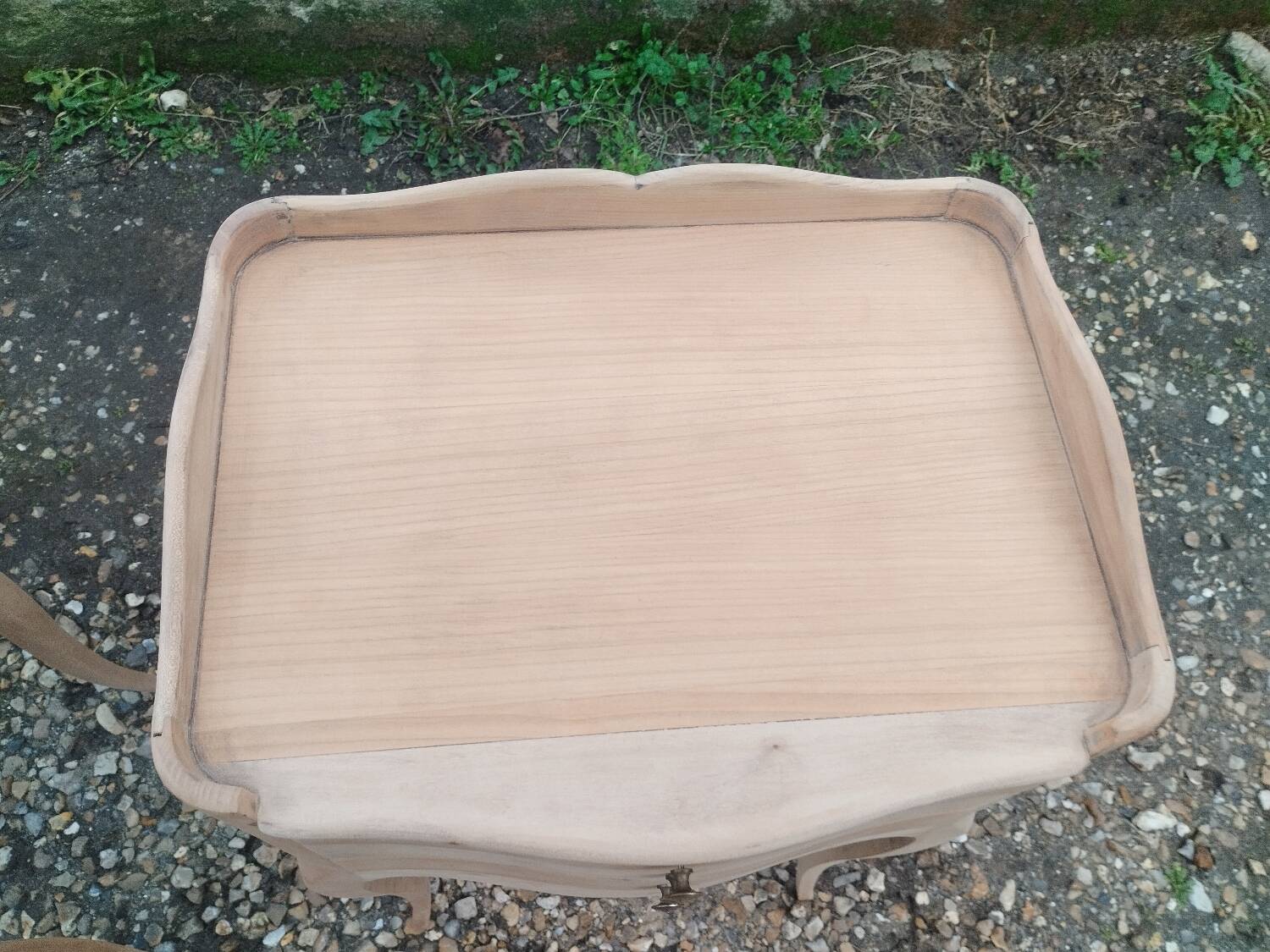 Pair of antique wooden bedside tables in Louis XV style.