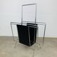 Chrome and black leather magazine rack, 1970s.