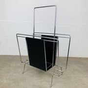 Chrome and black leather magazine rack, 1970s.