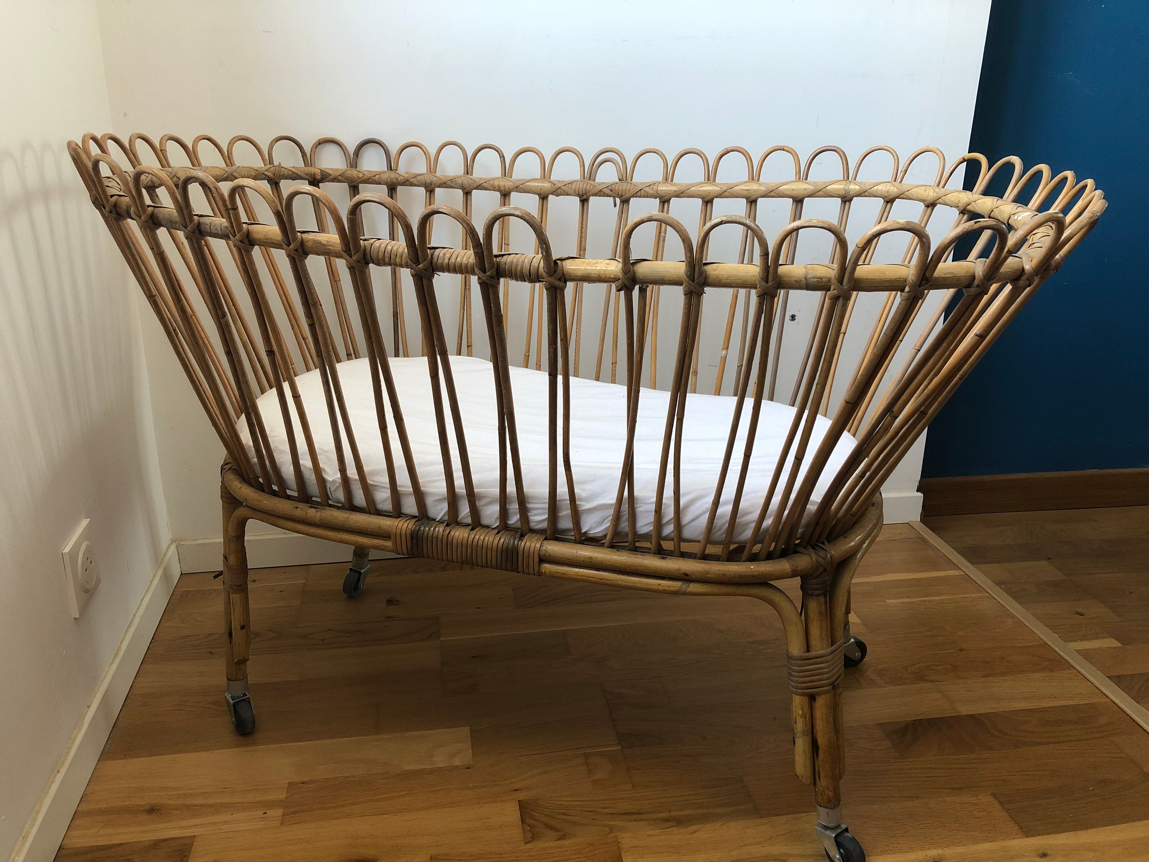 Vintage rattan cradle