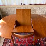 Expandable teak dining table, butterfly extension, circa 60s