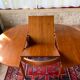 Expandable teak dining table, butterfly extension, circa 60s