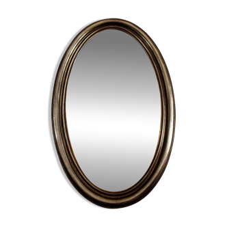 Antique oval mirror made in Belgium.