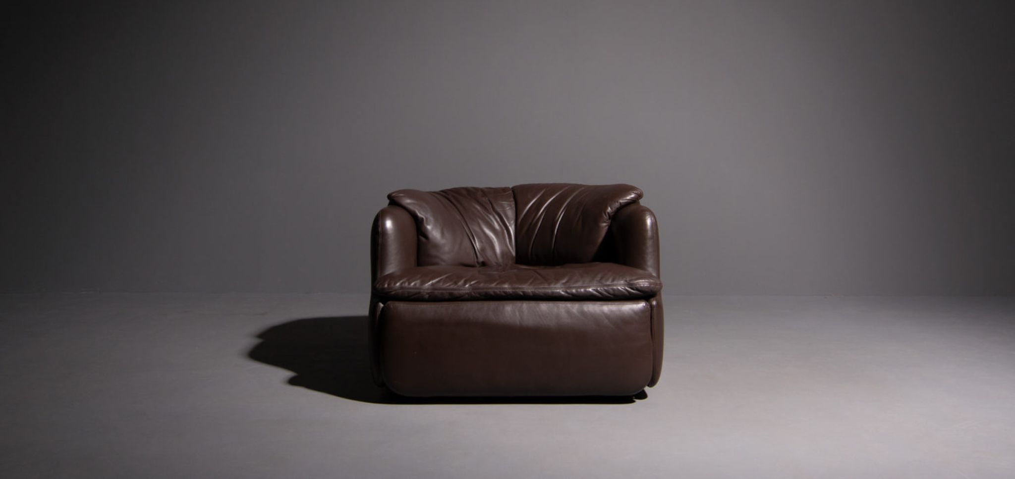 Saporiti armchair designed by Alberto Rosselli brown leather confidential model