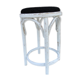 Old curved wooden stool revisited patinated white