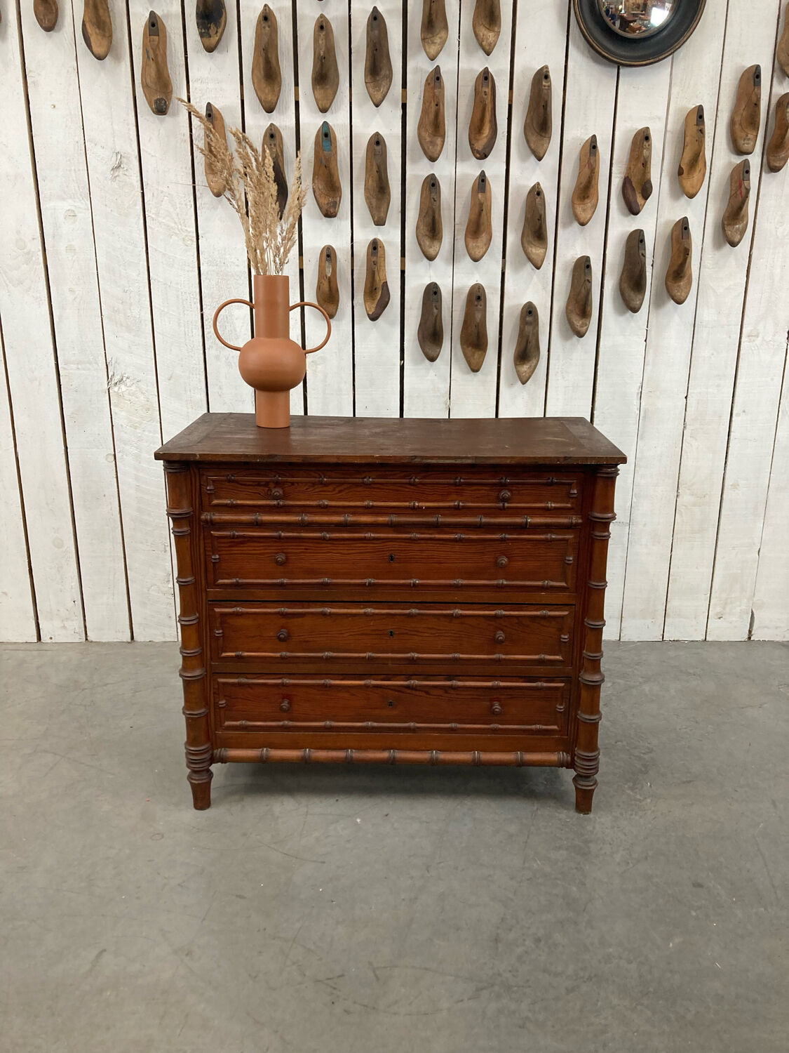 Old wooden chest of drawers imitation bamboo