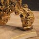 Italian lacquered and gilded round coffee table with glass top