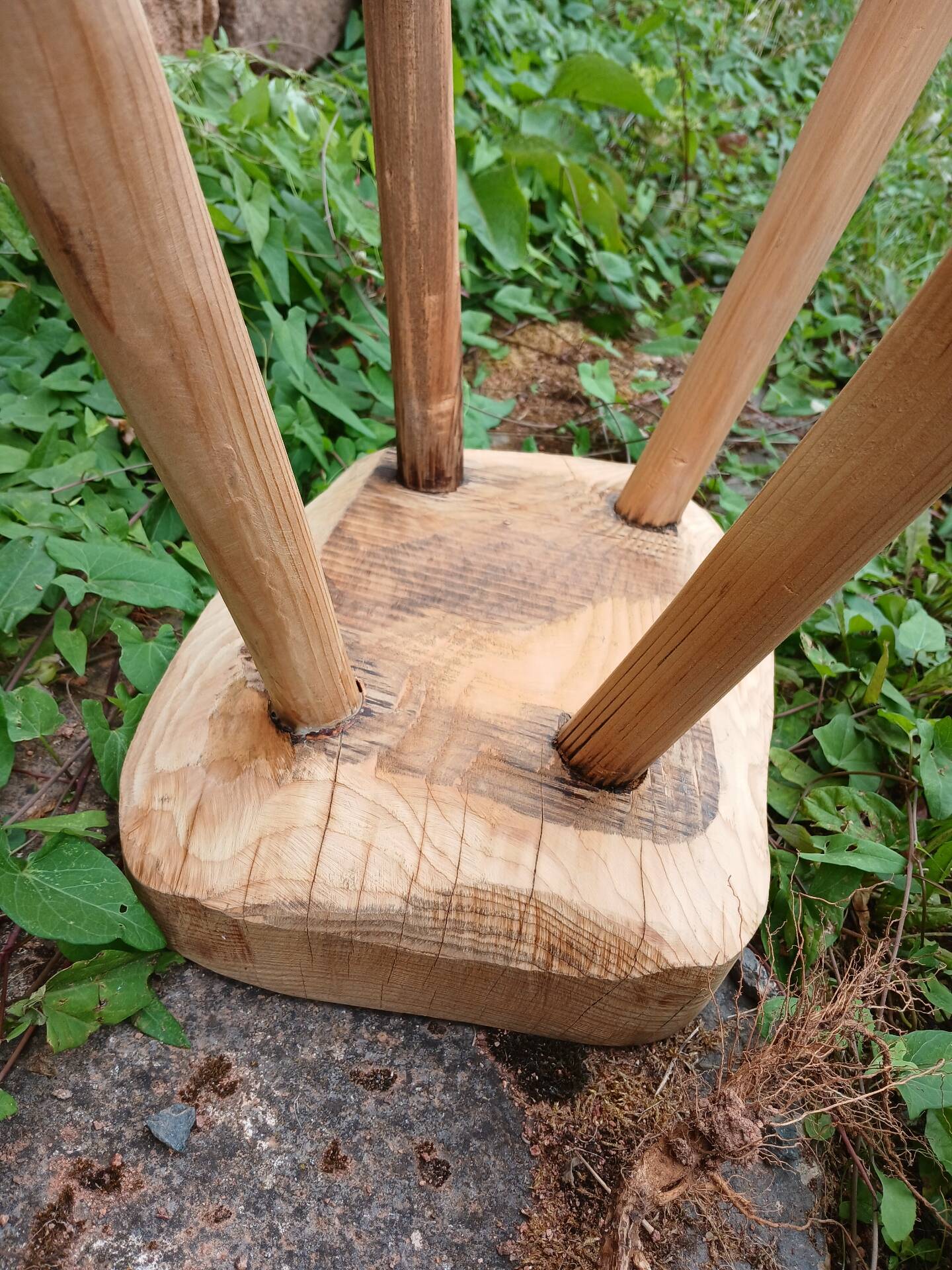 Antique stool in raw wood