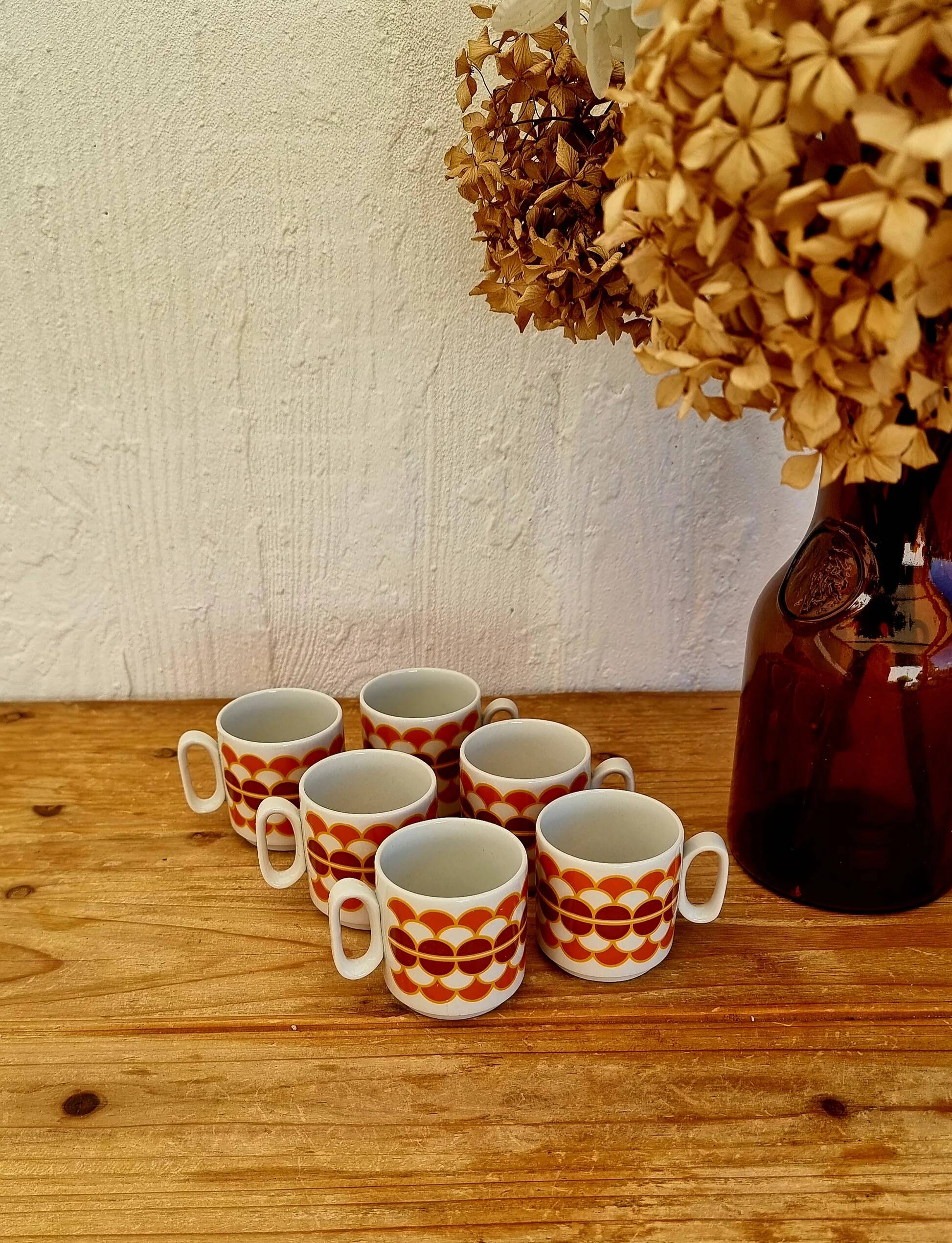 Set of 6 vintage ADP porcelain cups with orange decoration from the 1970s.
