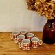 Set of 6 vintage ADP porcelain cups with orange decoration from the 1970s.