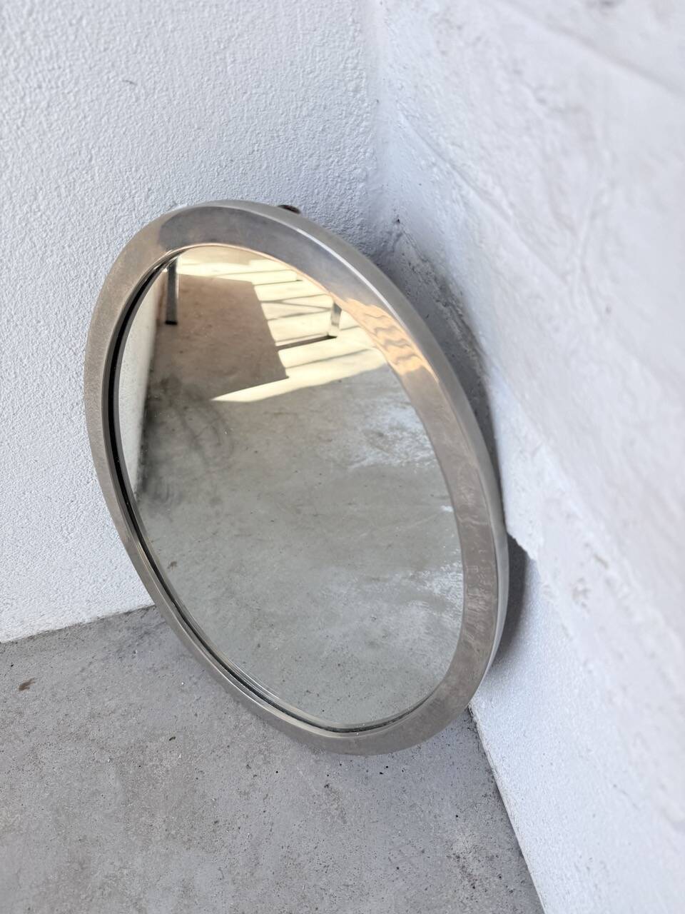 Miroir en métal argenté ovale 1950