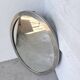 Miroir en métal argenté ovale 1950