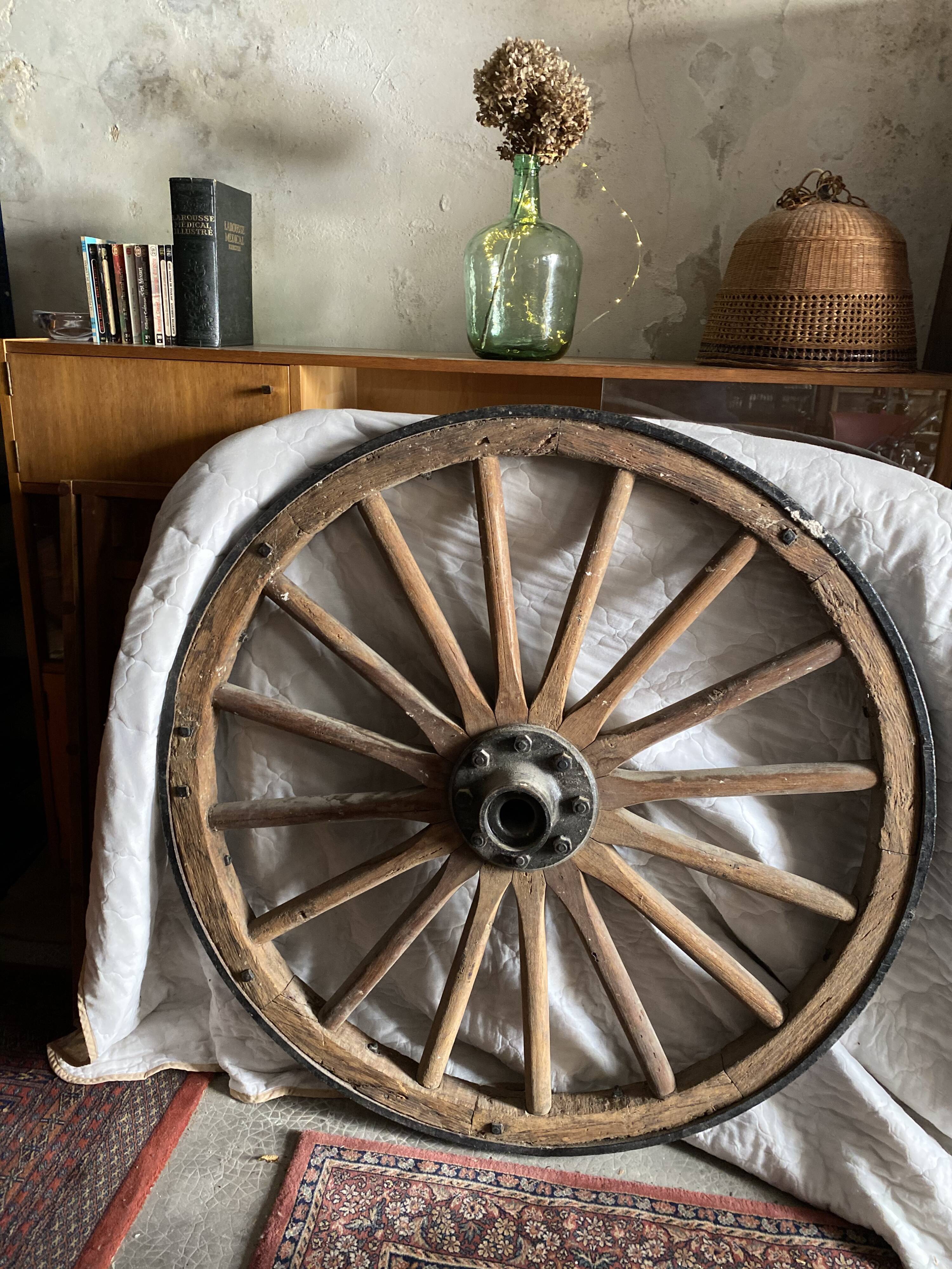 Wheel of wooden and cast iron cart