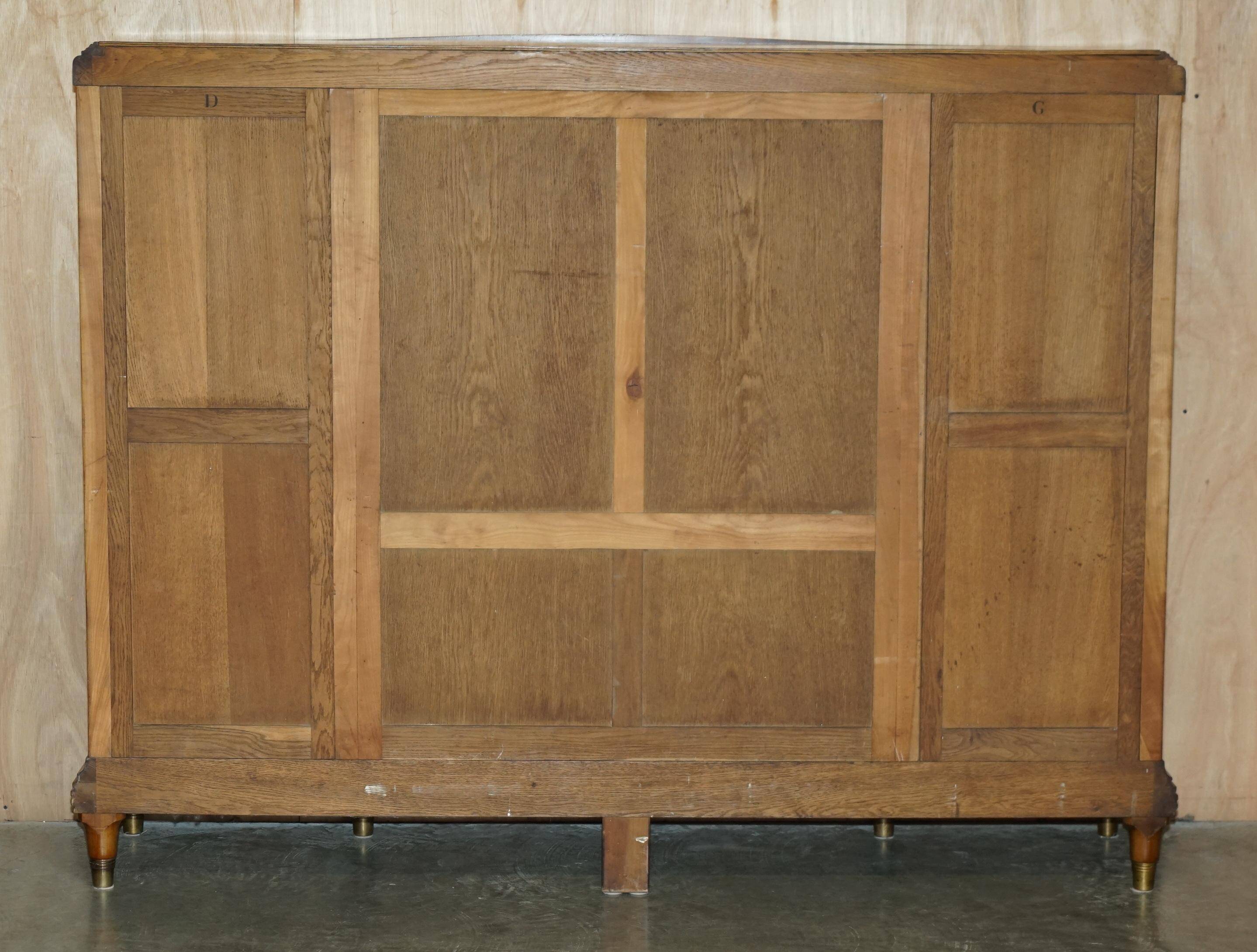 Bibliothèque-armoire Art Nouveau en noyer burr et chêne par Léon Jallot