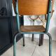 Old wooden and metal children's school chair