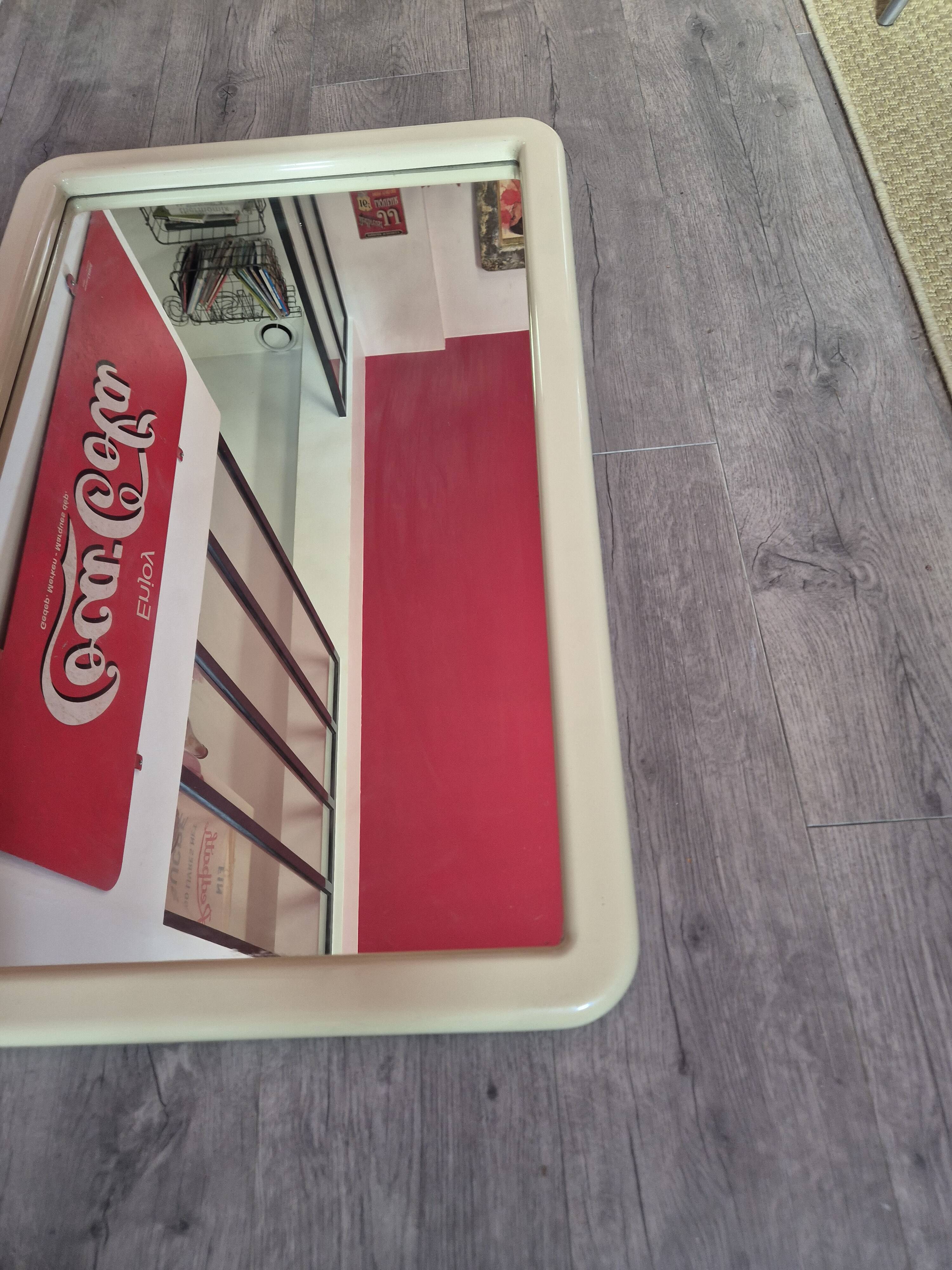 vintage mirror from the 70s with a large beige border, 90 by 60 cm