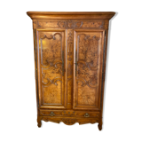 Wedding wardrobe of the Bressan country in walnut and walnut magnifying glass dated 1850