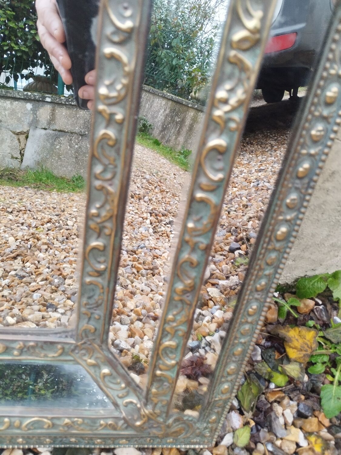 Antique mirror with copper moulding.