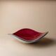 Red enameled steel bowl with textured interior and silver exterior; vintage Italian 1970s design