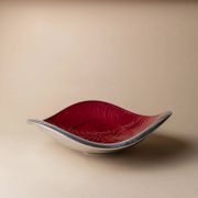 Red enameled steel bowl with textured interior and silver exterior; vintage Italian 1970s design