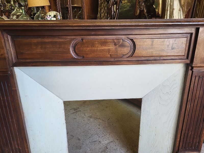 Facade of antique wooden fireplace