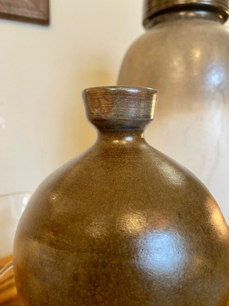 Enamelled ceramic bottle